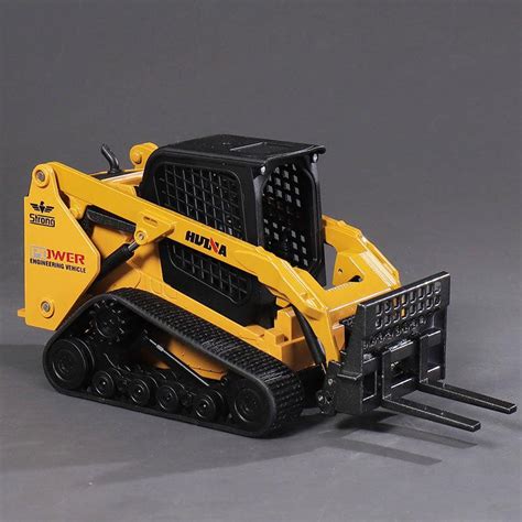 skid steer ride on toy|toy skid steer with tracks.